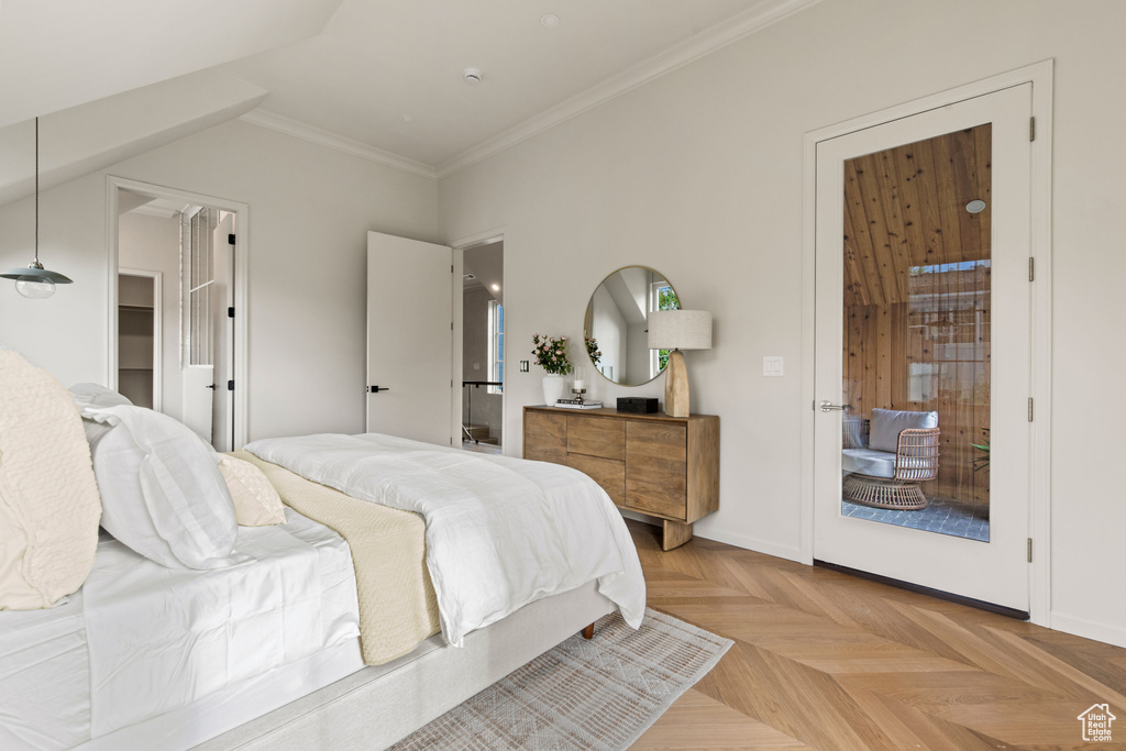 Bedroom with crown molding and access to exterior