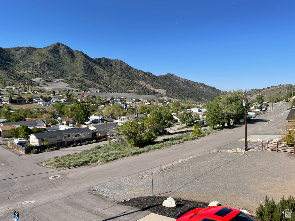 View of mountain backdrop with nearby suburban area
