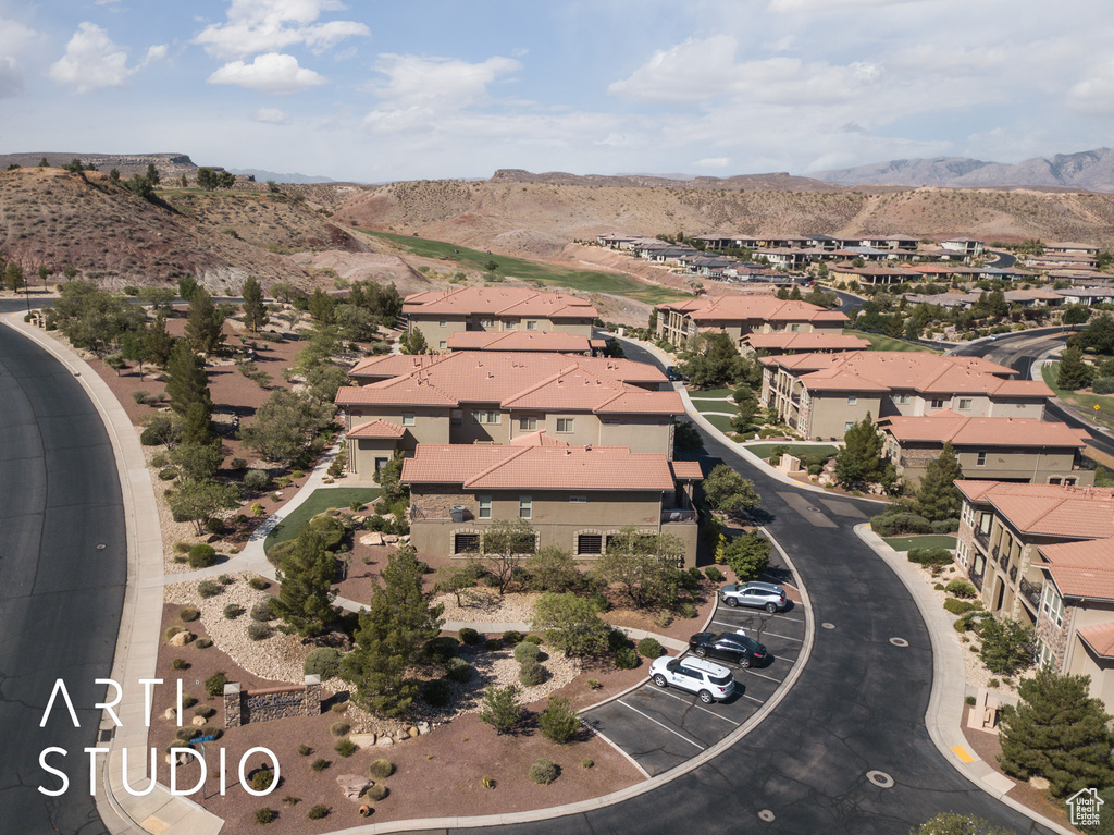 Aerial view of property\\\\\\\'s location with nearby suburban area and a mountain backdrop