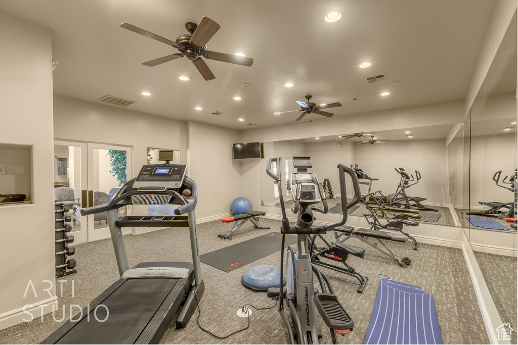 Gym featuring ceiling fan and recessed lighting