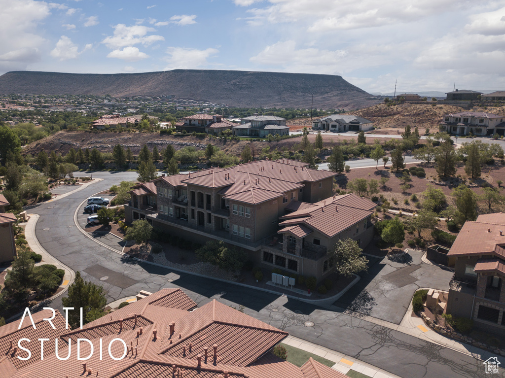 Aerial view of residential area with a mountainous background