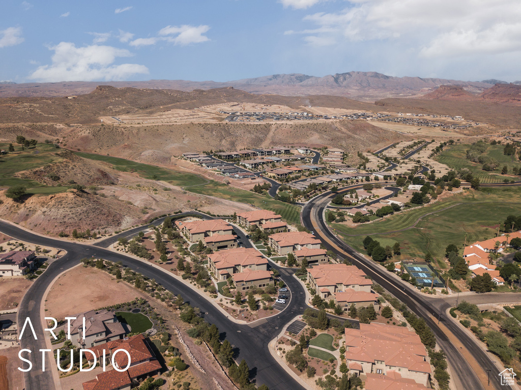 Aerial view of property\\\\\\\'s location with a mountain backdrop and nearby suburban area