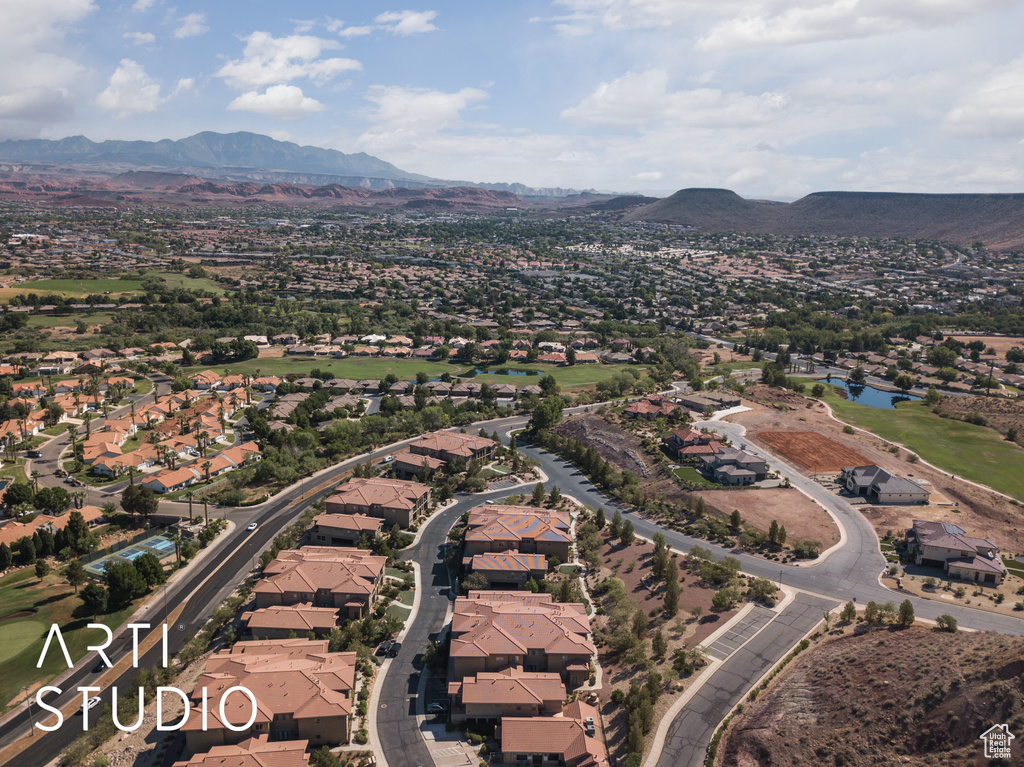 View of property location with nearby suburban area and a water and mountain view