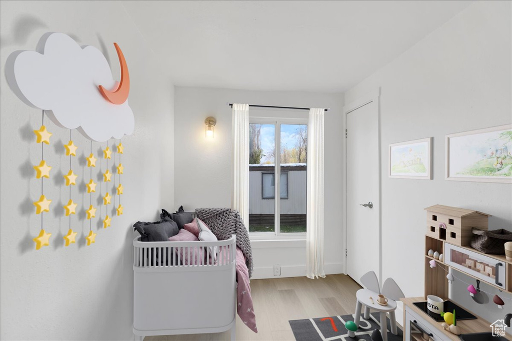 Bedroom featuring wood finished floors
