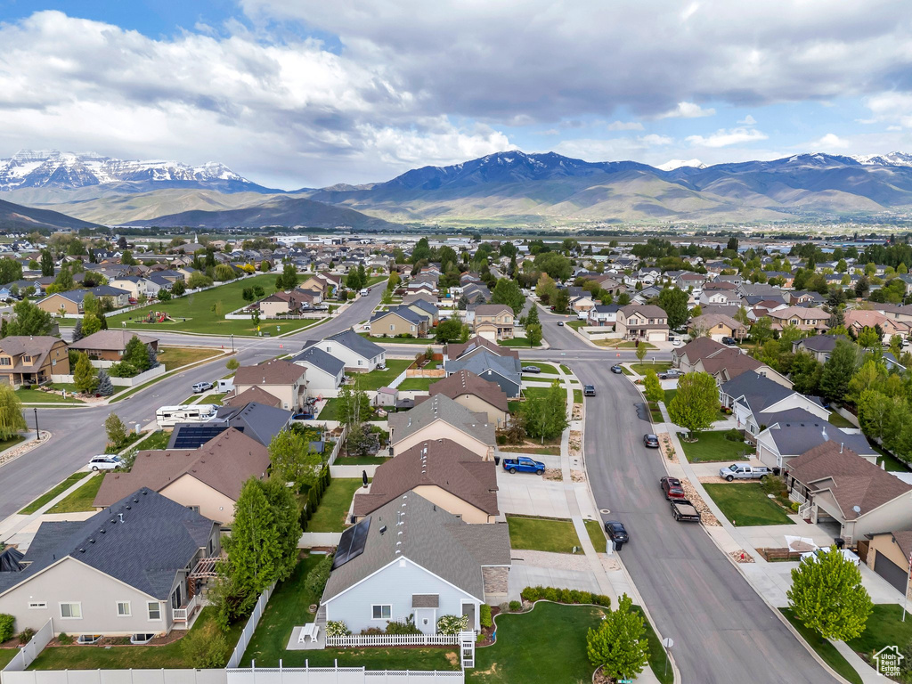 Aerial view of residential area with a mountain backdrop