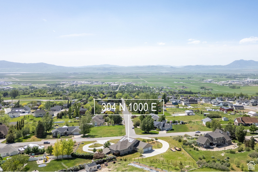 Aerial view of residential area with a mountain backdrop