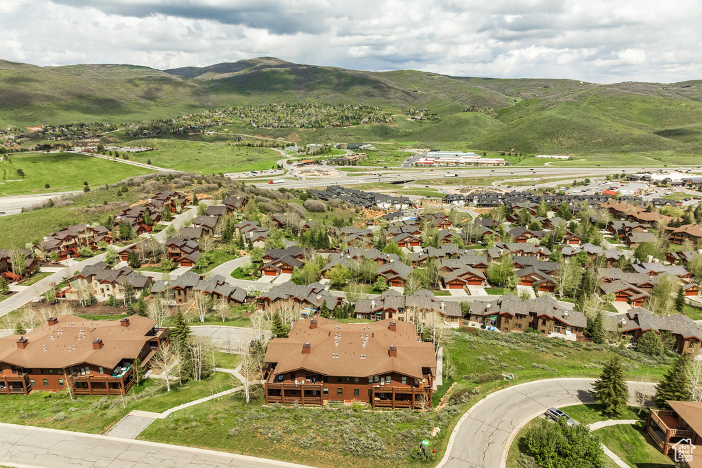 Aerial view of residential area with a mountain backdrop