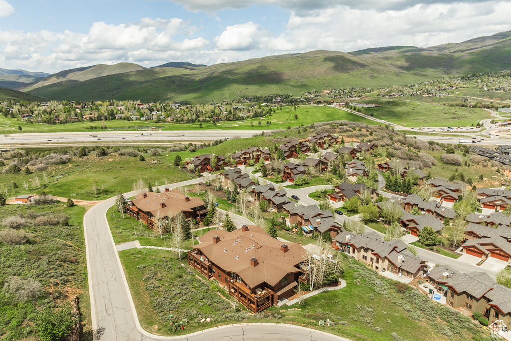 Aerial view of residential area with mountains