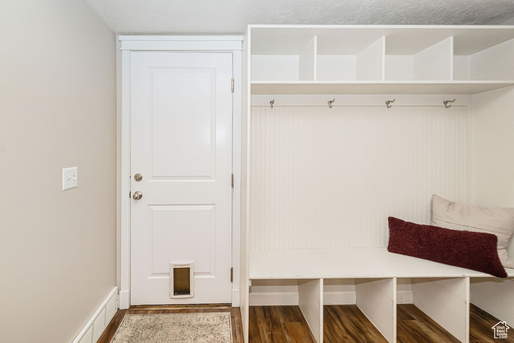 Mudroom featuring wood finished floors