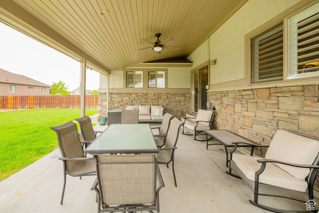 View of patio / terrace with a ceiling fan, outdoor dining space, and outdoor lounge area
