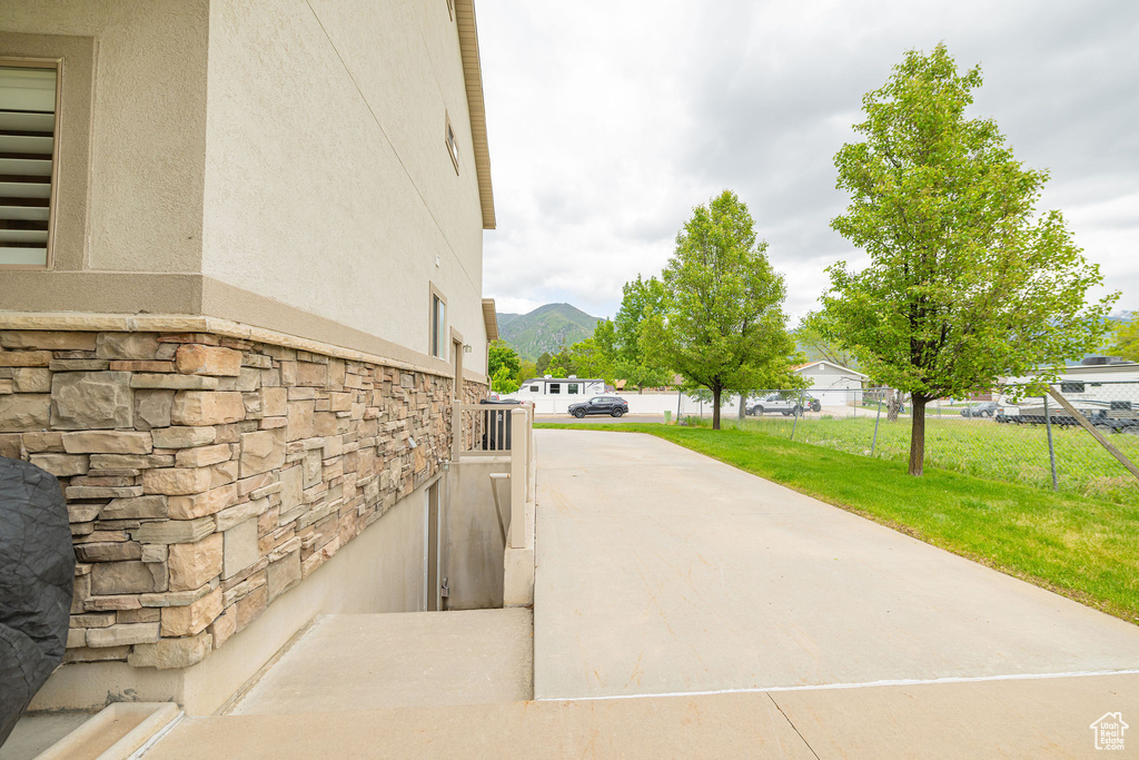 View of patio with a mountain view