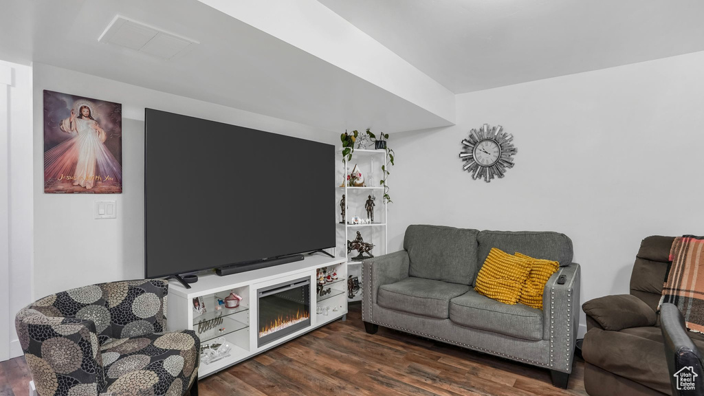 Living area with wood finished floors