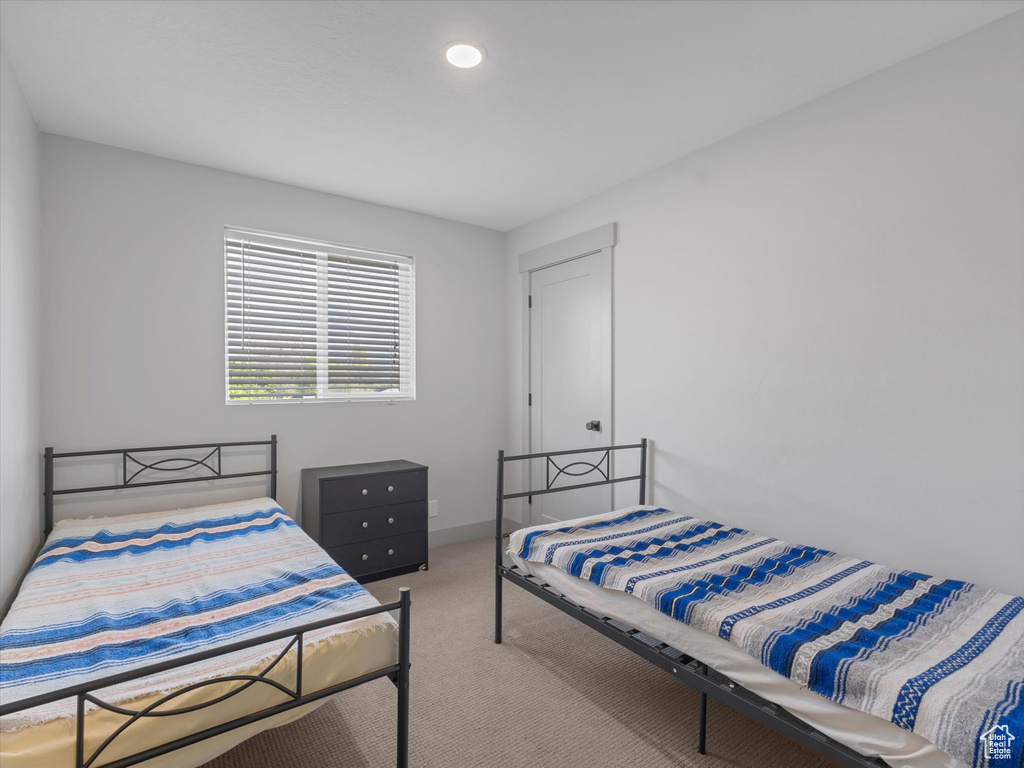 Bedroom featuring carpet