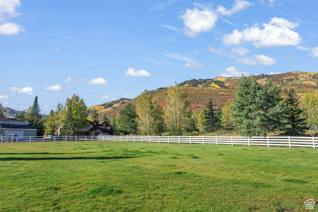 View of yard featuring a mountain view and a rural view
