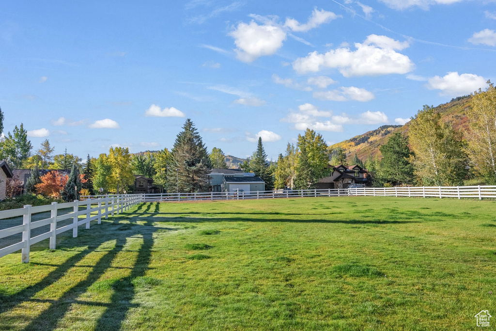 View of yard featuring a mountain view and a rural view