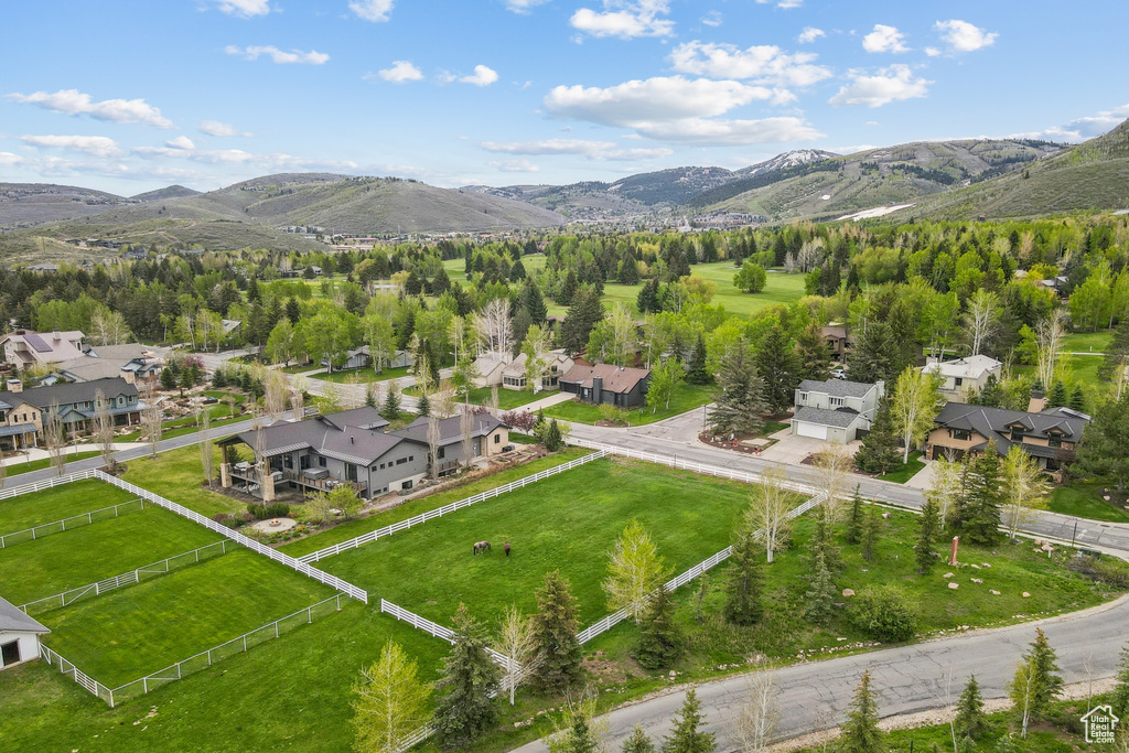 Aerial view of residential area featuring mountains