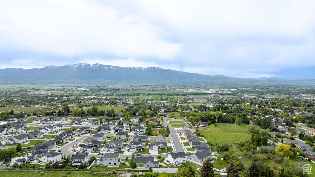 Aerial view of residential area with a mountain backdrop