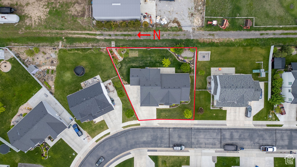 Aerial view of property and surrounding area with property boundaries highlighted