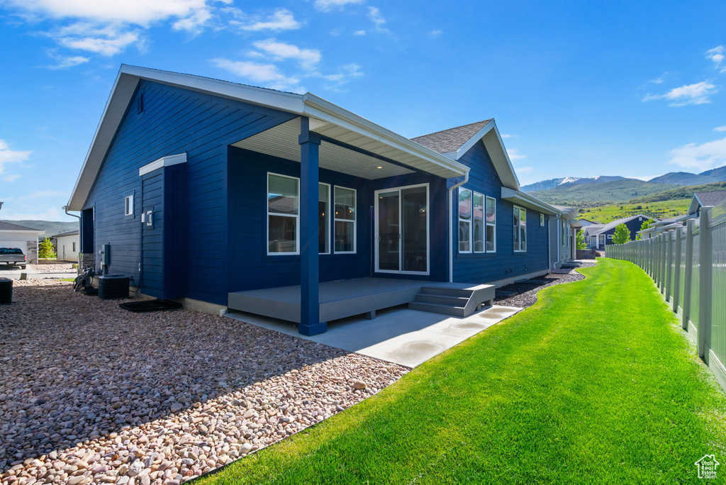 View of property exterior with a mountain view