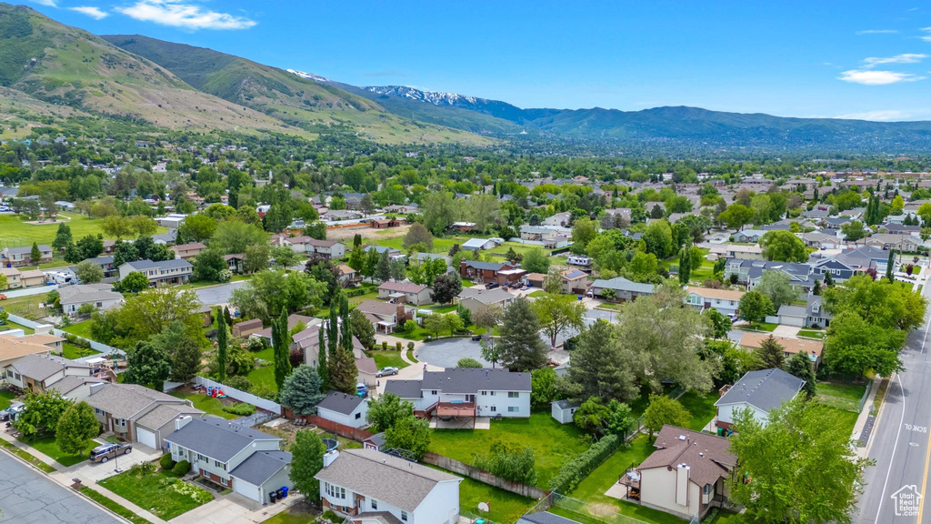 Aerial perspective of suburban area featuring mountains