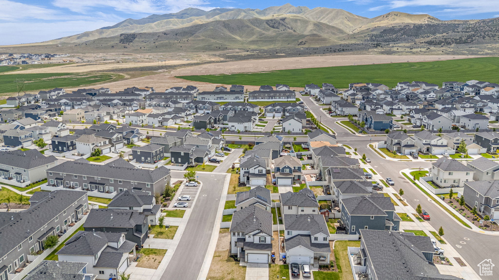 Aerial view of residential area with a mountain backdrop