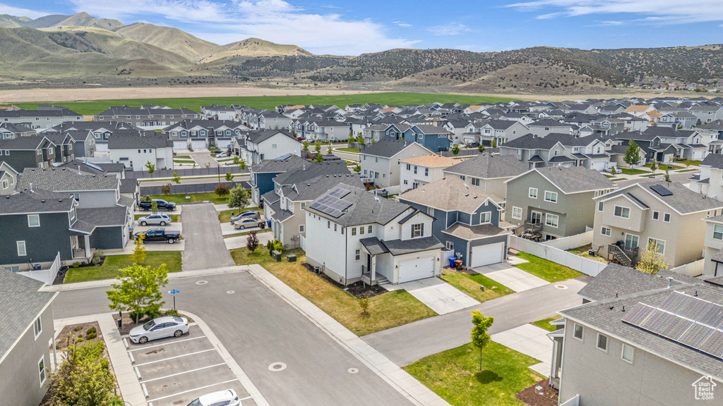Aerial view of residential area with a mountainous background