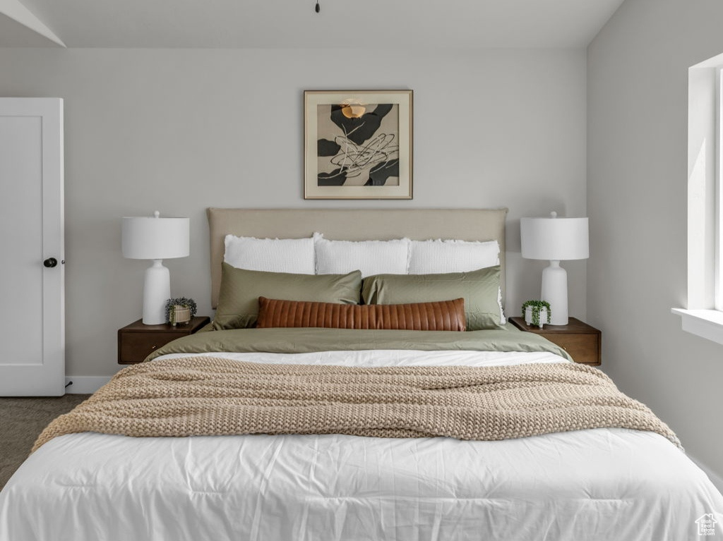 Bedroom featuring carpet floors and ceiling fan