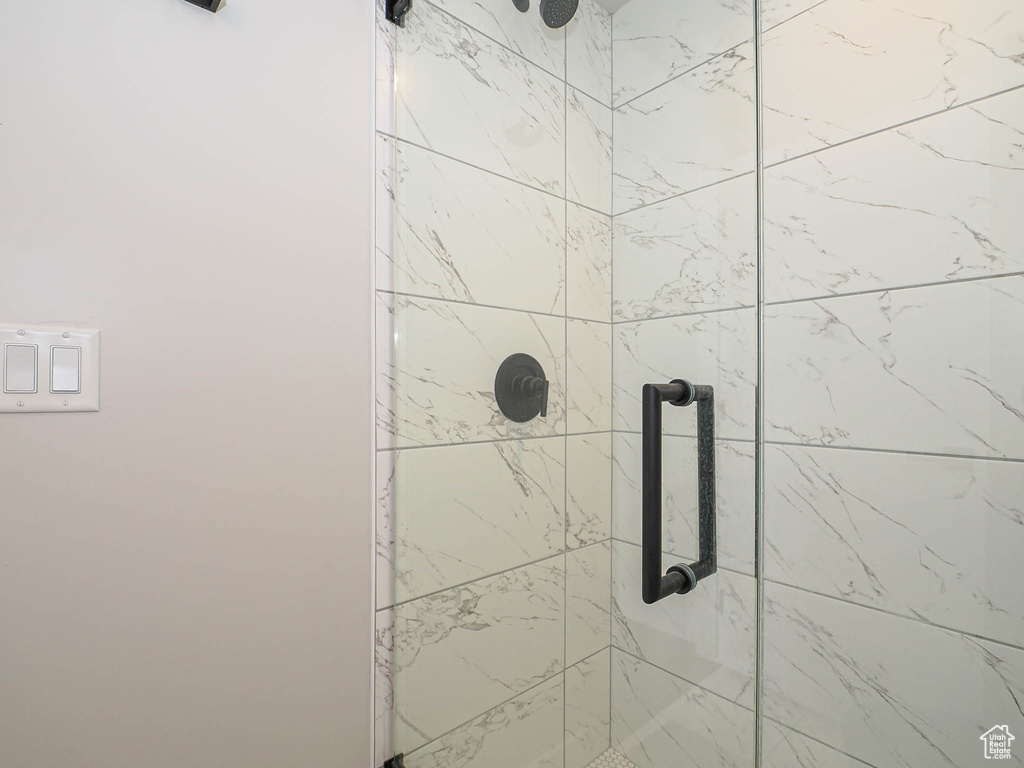Full bath with tiled shower
