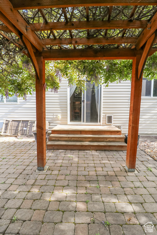 View of patio featuring a pergola