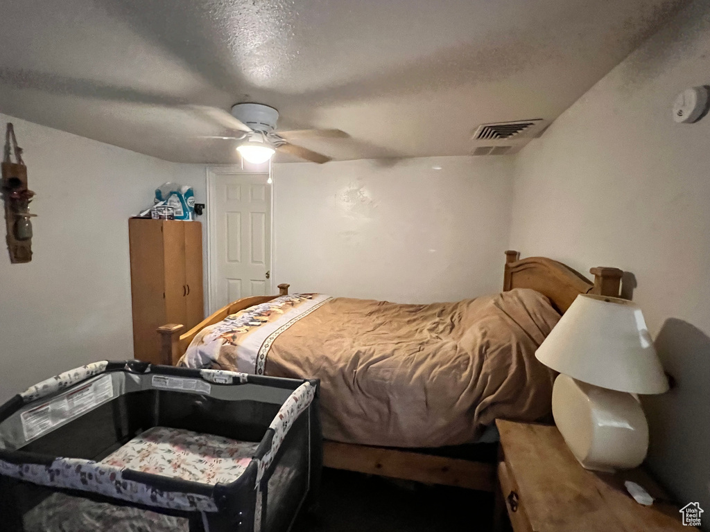 Bedroom with a ceiling fan