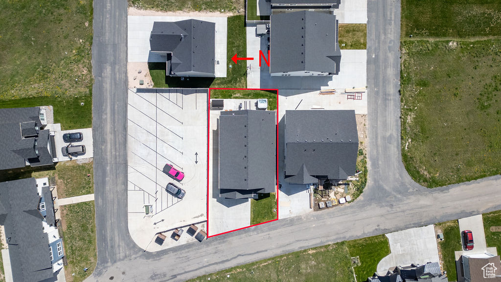 Aerial perspective of suburban area with property boundaries highlighted