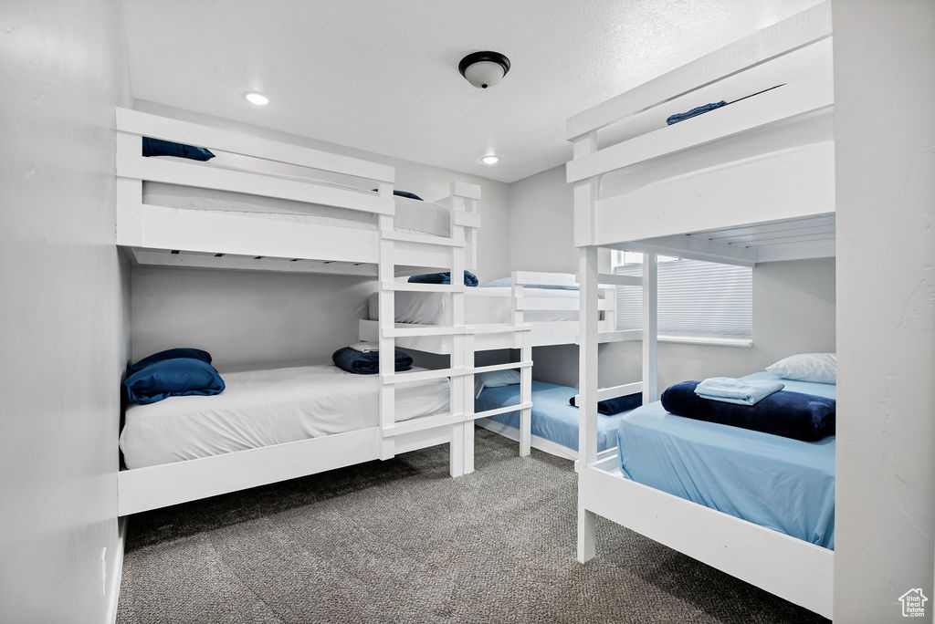 Bedroom featuring carpet floors