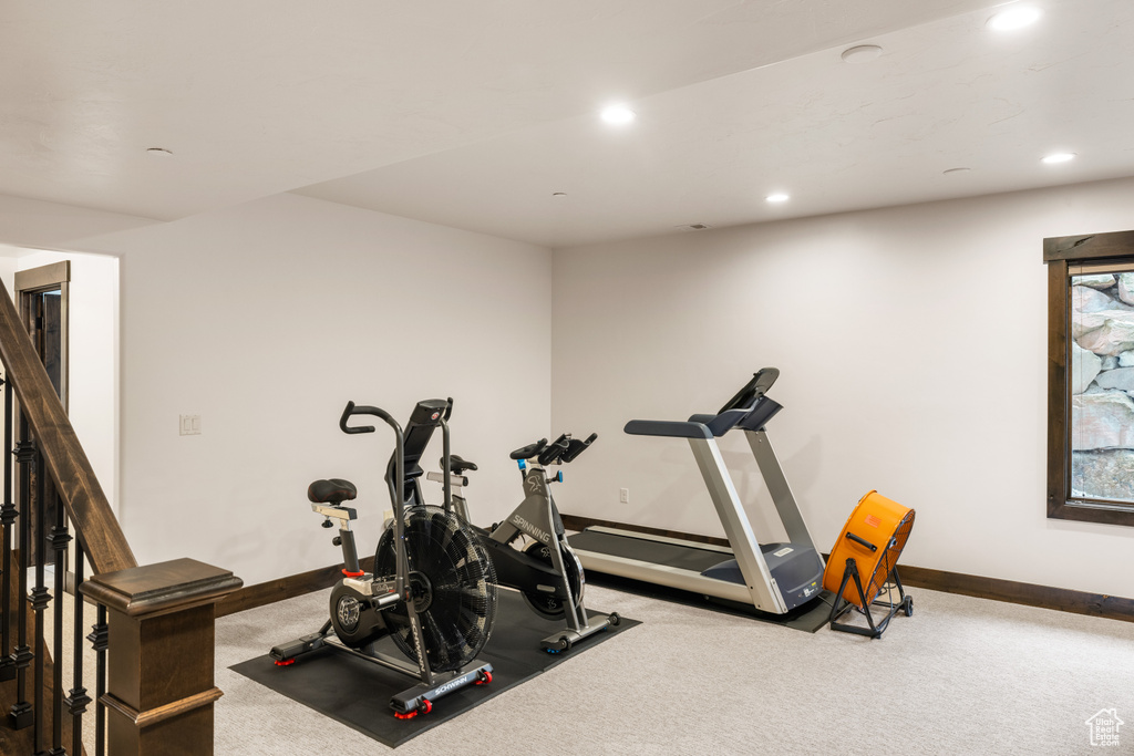 Workout area with baseboards, carpet, and recessed lighting