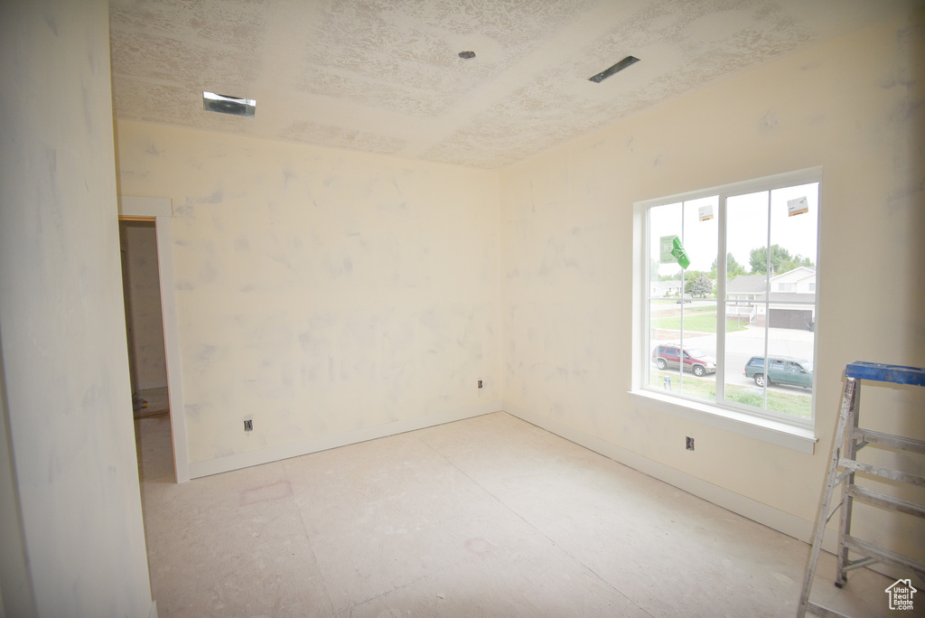 Empty room with baseboards