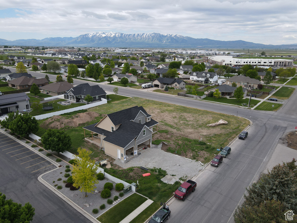 Aerial view of residential area with a mountainous background