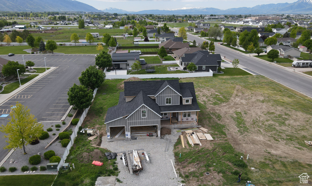 Aerial perspective of suburban area with a mountain backdrop
