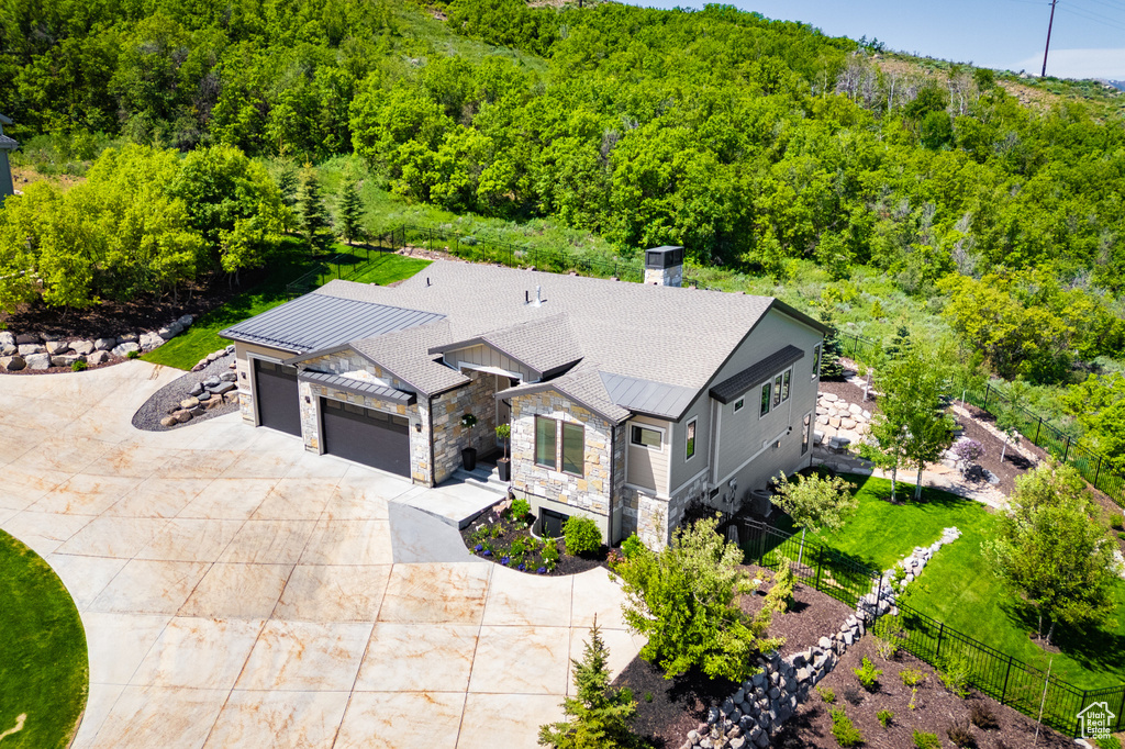 View from above of property featuring a forest