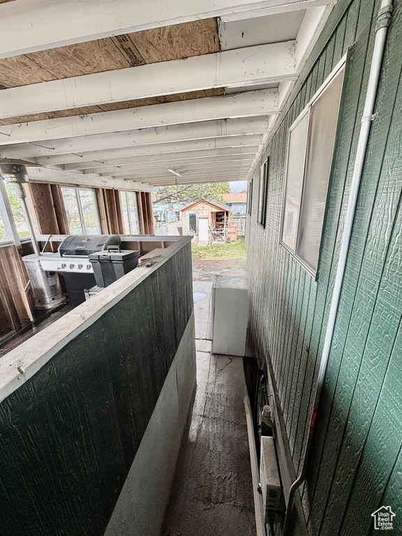 View of patio featuring an outbuilding and grilling area