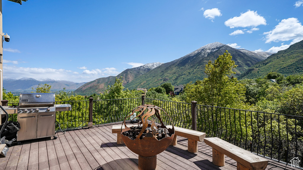 Deck featuring grilling area and a mountain view