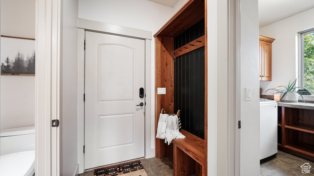 Mudroom featuring light tile patterned floors