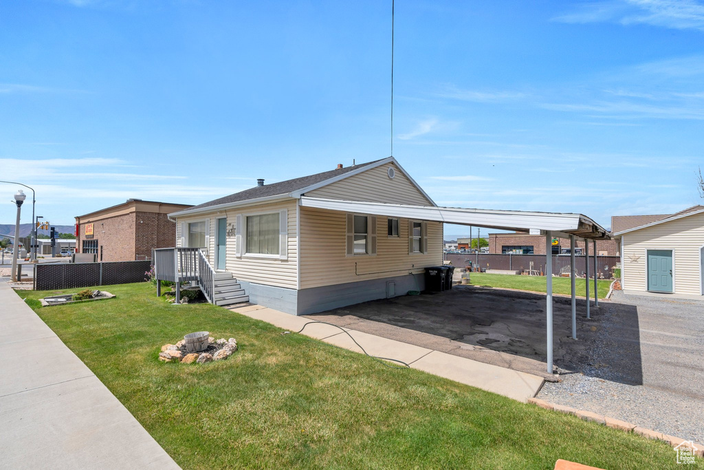View of front of property featuring driveway