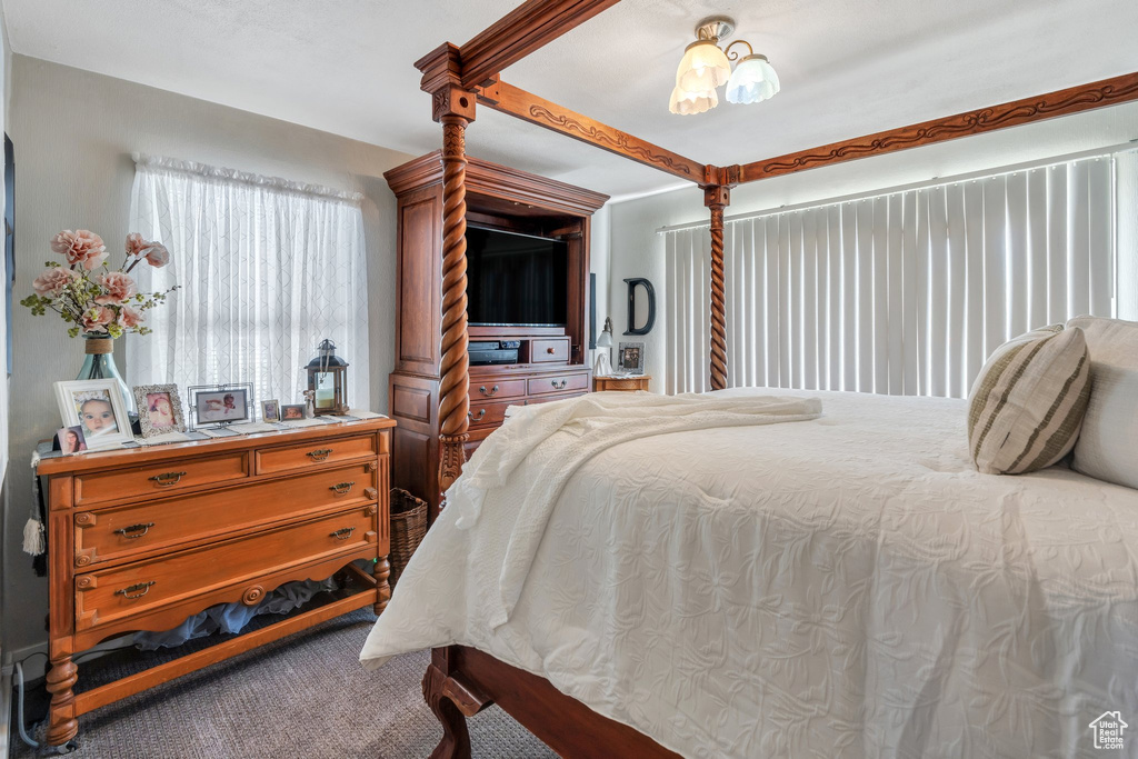 Bedroom with carpet flooring