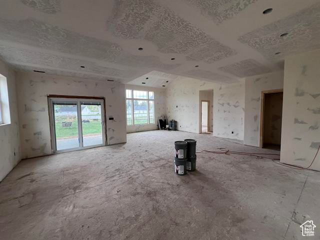 Unfurnished room with plenty of natural light