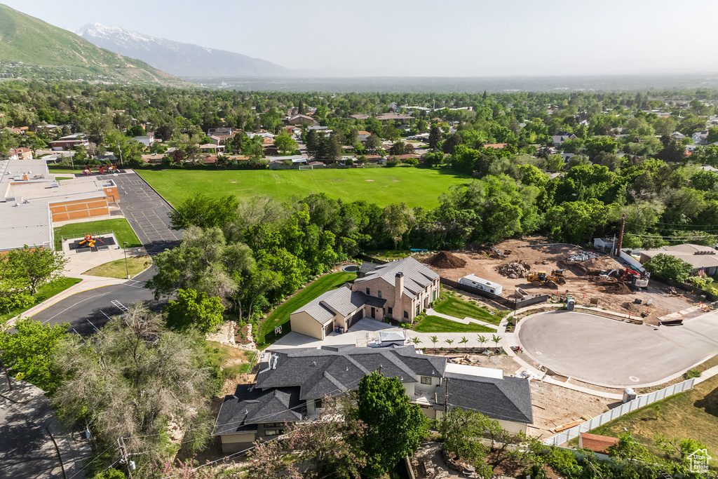 Aerial view of residential area with a mountainous background