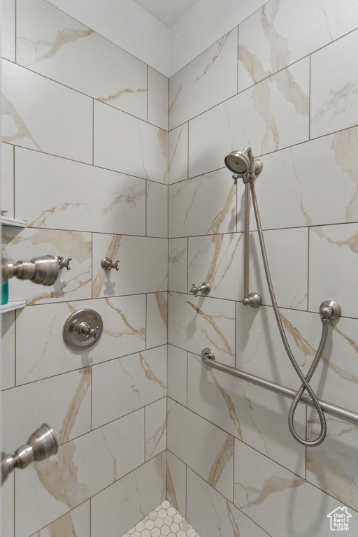 Bathroom with tiled shower