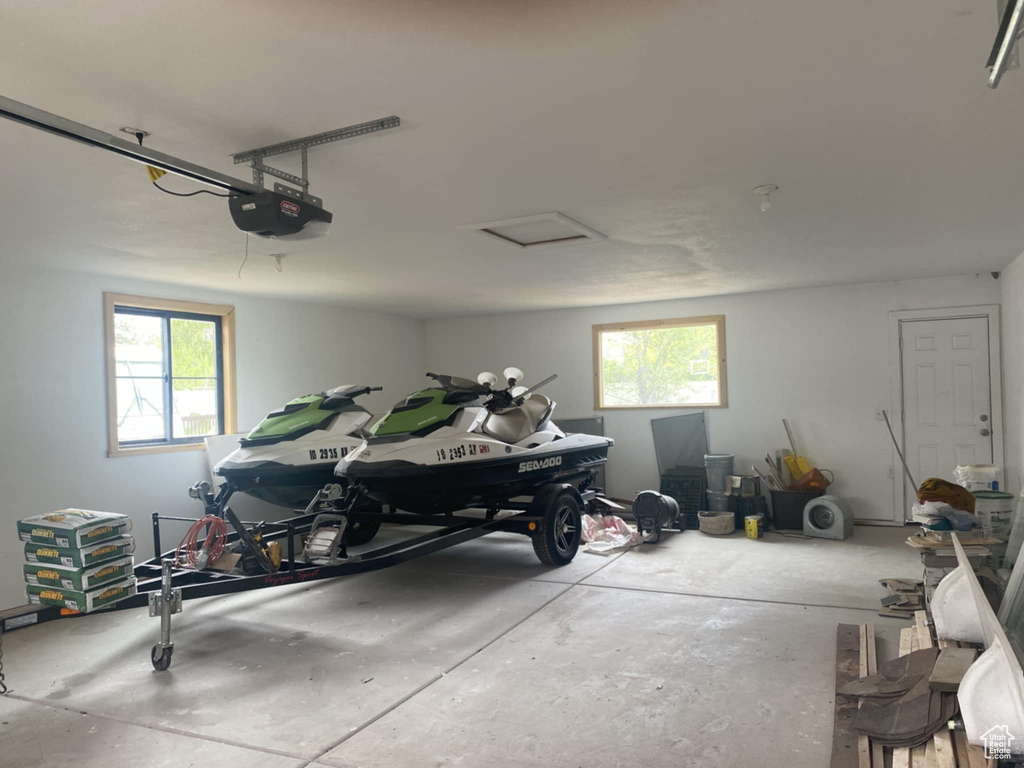 Garage featuring a garage door opener