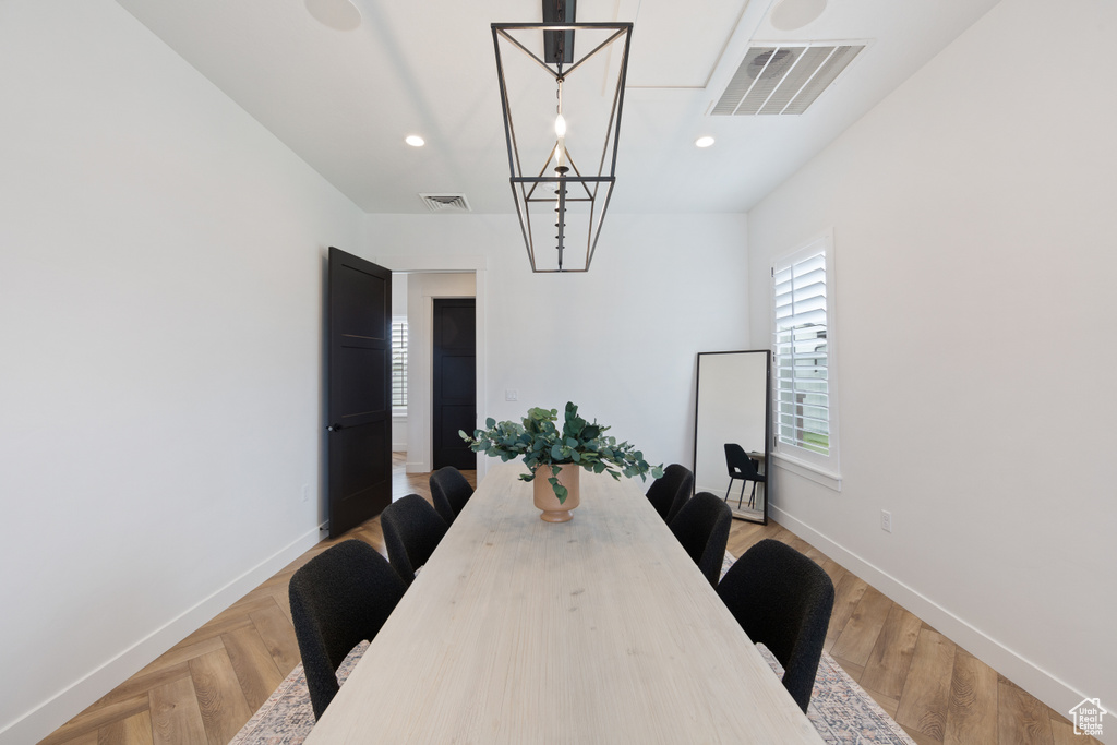 Dining space featuring baseboards and recessed lighting