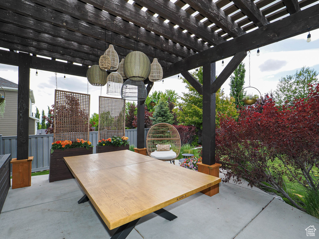 View of patio / terrace with a pergola and outdoor dining space