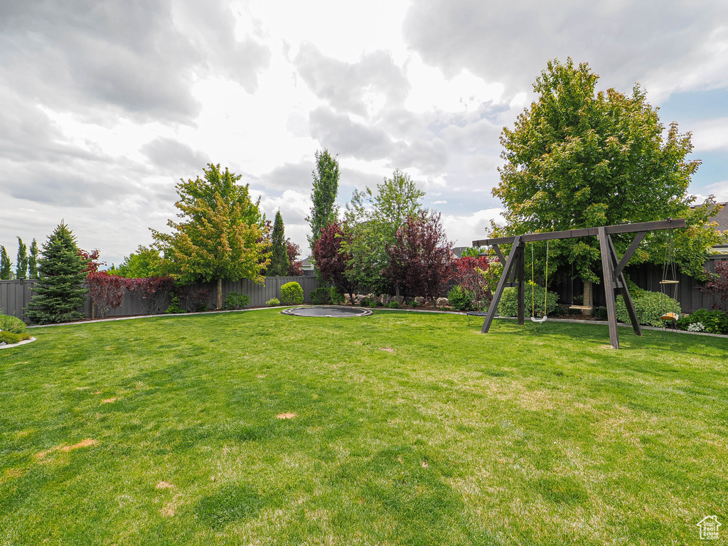 View of yard with a playground