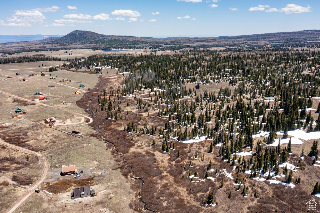 Aerial overview of property\'s location with mountains